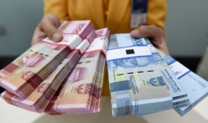 Ilustrasi Uang pecahan seratus ribu dan lima puluh ribu rupiah Antara Foto