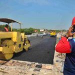 antarafoto pengaspalan jalan jembatan